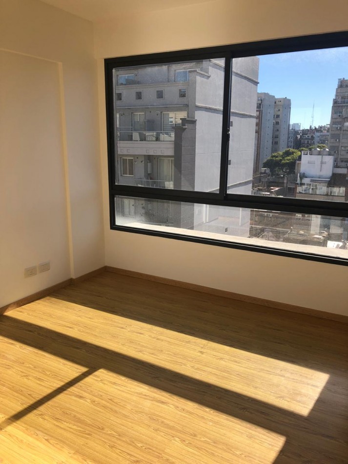 2 ambientes al frente con balcon cochera y toilette