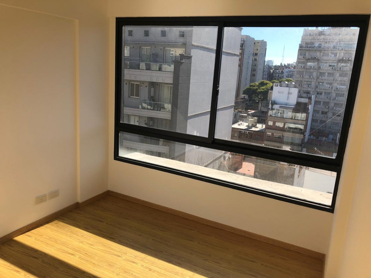 2 ambientes al frente con balcon cochera y toilette