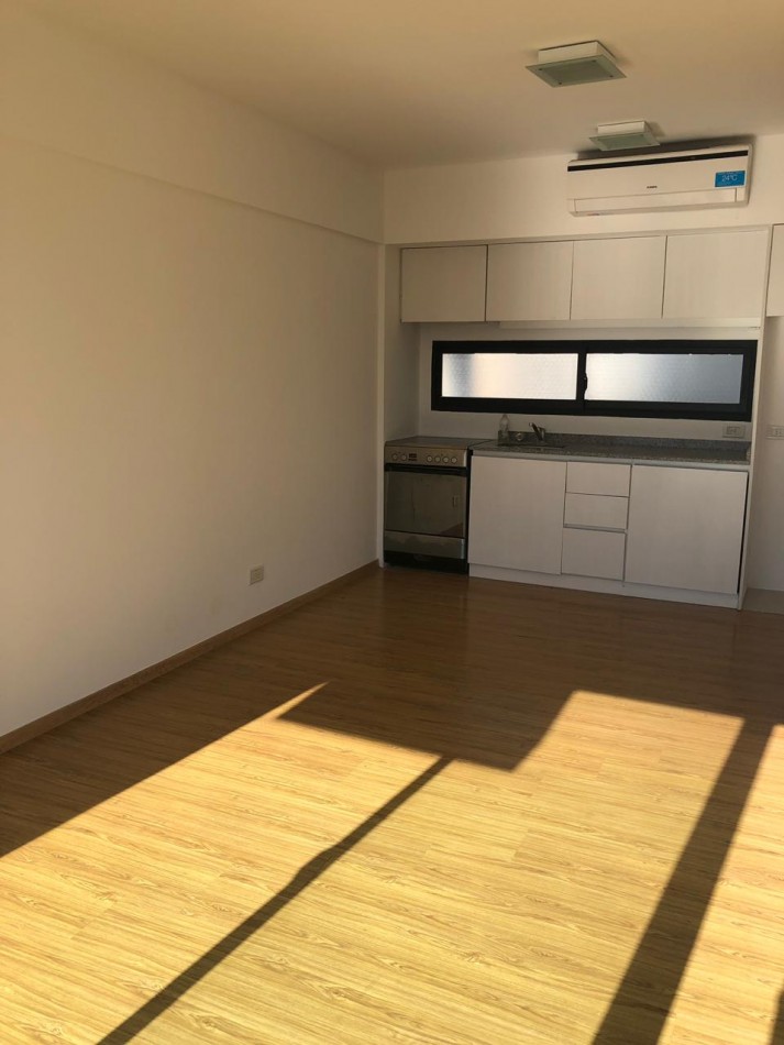 2 ambientes al frente con balcon cochera y toilette